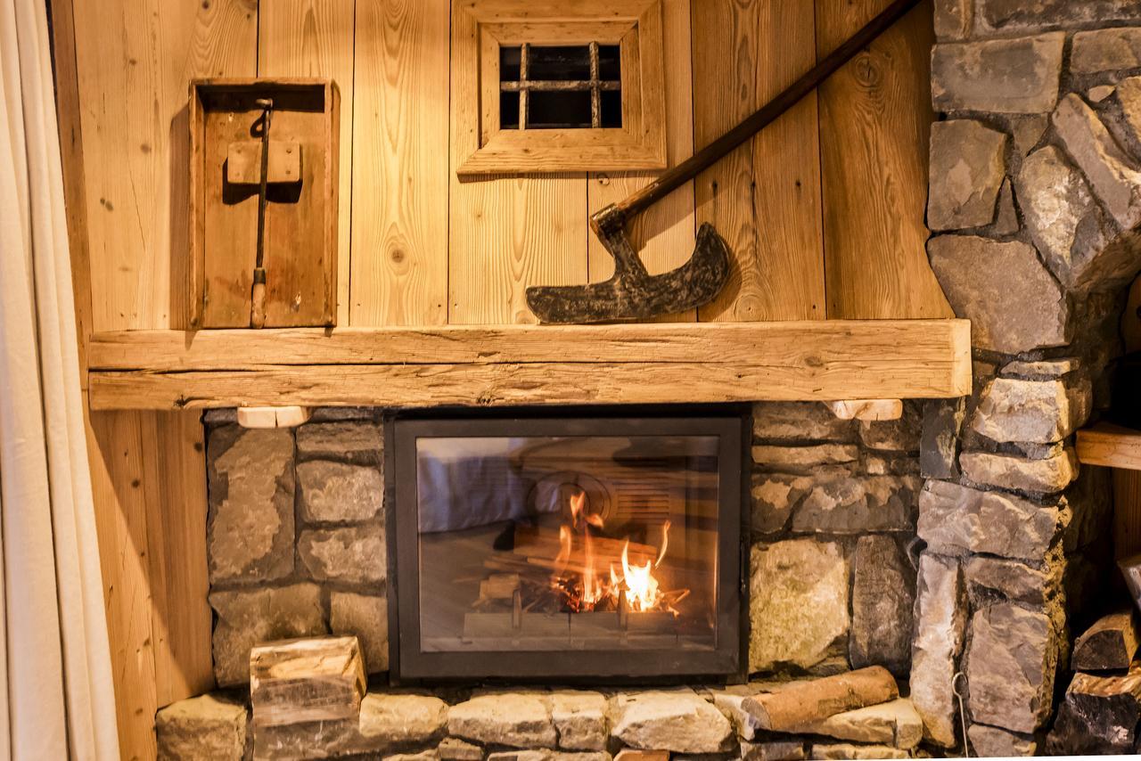 Отель Marc Veyrat - La Maison Des Bois Маниго Экстерьер фото