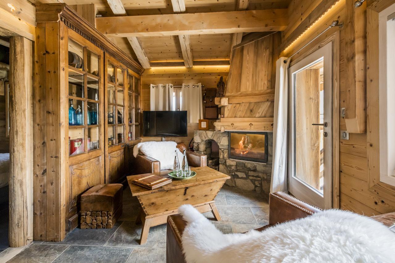 Отель Marc Veyrat - La Maison Des Bois Маниго Экстерьер фото